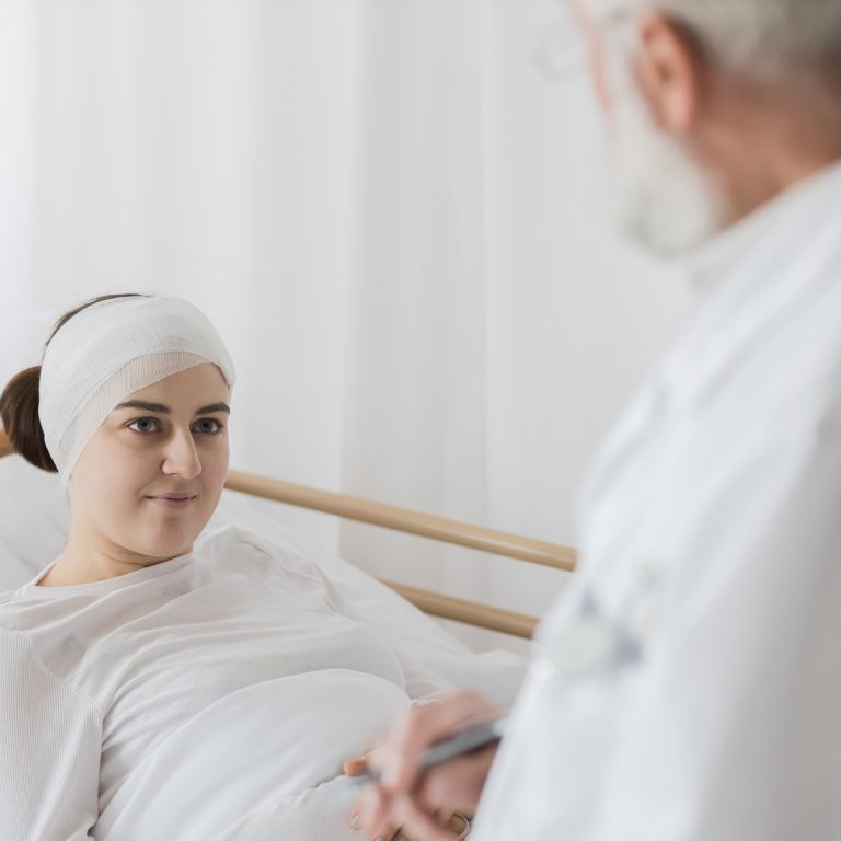 Woman after surgery receiving Post Hospitalization Care at home